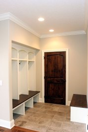 2-Rear hall entry from garage, lockers and bench with adjacent storage closet