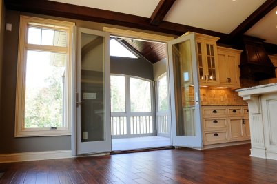10-Double doors lead to screened-in porch