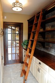 6-Inside pantry with ladder and stone backsplash