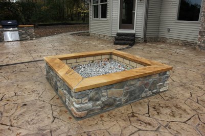 17-Rear stamped patio with stone firepit