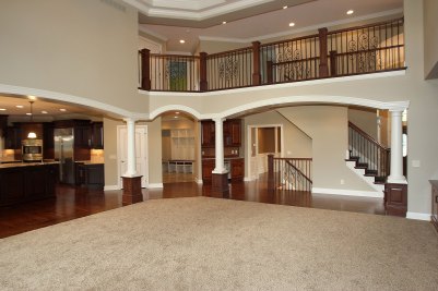 2-Second floor wrought iron balustrade above Great room arched openings