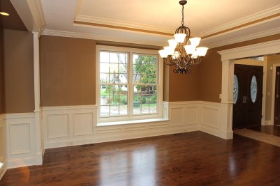 4-Paneled wainscoting in dining room  with trayed ceiling