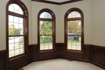 7-Arched windows in study with wainscoting