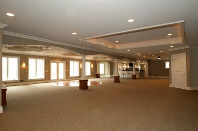 17-Lower level entertainment area with dance floor and bar beyond.