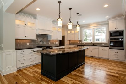7-Kitchen with custom painted cabinetry and granite countertops
