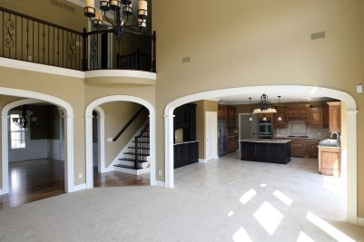 6-Great Room open to Foyer, Dining Area, Kitchen, and second floor juliet balcony with wrought iron railing
