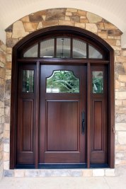 2-Custom single panel door and sidelights with curved transom above